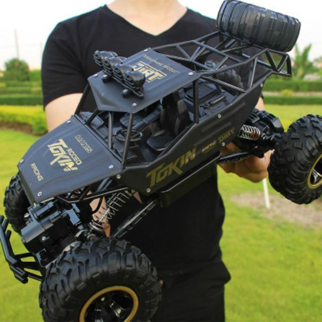 4WD RC Autos Aktualisierte Version 2.4G Funkgesteuerte RC Autos Spielzeug Buggy Hochgeschwindigkeits-Trucks Geländewagen Spielzeug für Kinder